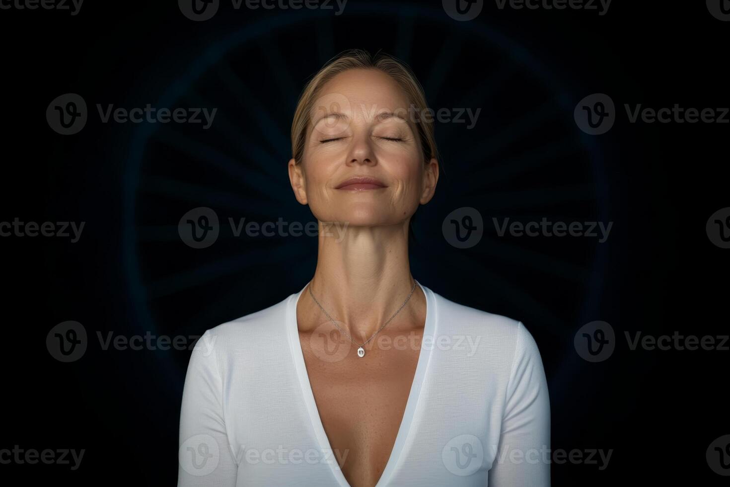 Mindfulness practice with a serene woman meditating indoors at dusk, focusing on inner peace and tranquility photo