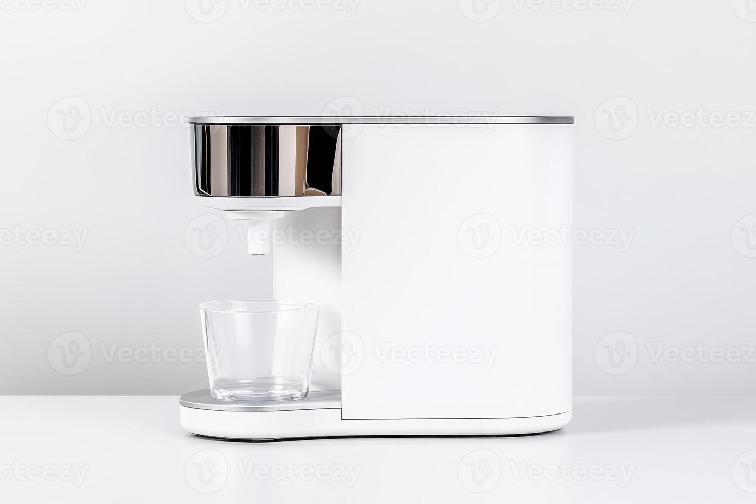 Modern water dispenser with sleek design placed on a clean countertop in a contemporary kitchen setting photo