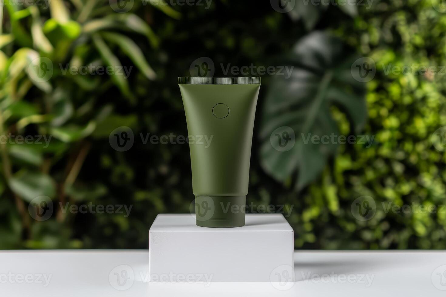 Product display of a green tube on a white pedestal set against a lush green background showcasing natural beauty and eco-friendly themes photo