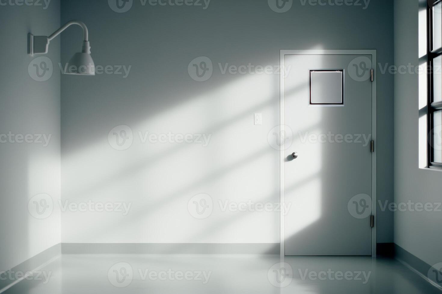 Bright sunlight streams into a minimalistic room, highlighting shadow patterns on the smooth floor and an empty doorway photo
