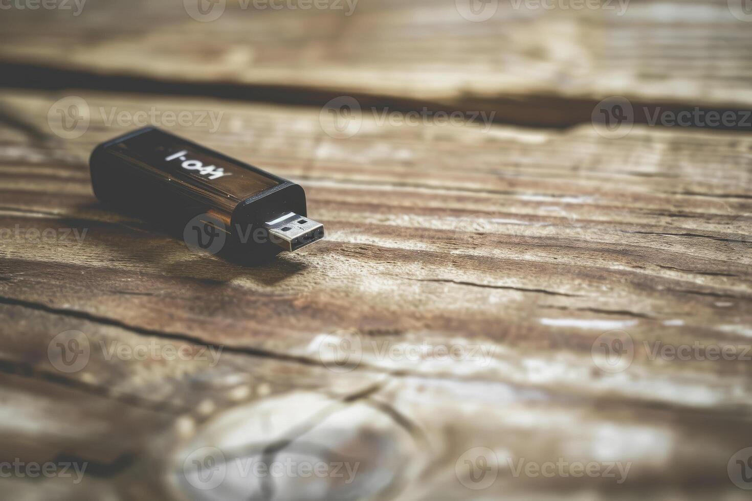 A usb drive on a wooden table photo