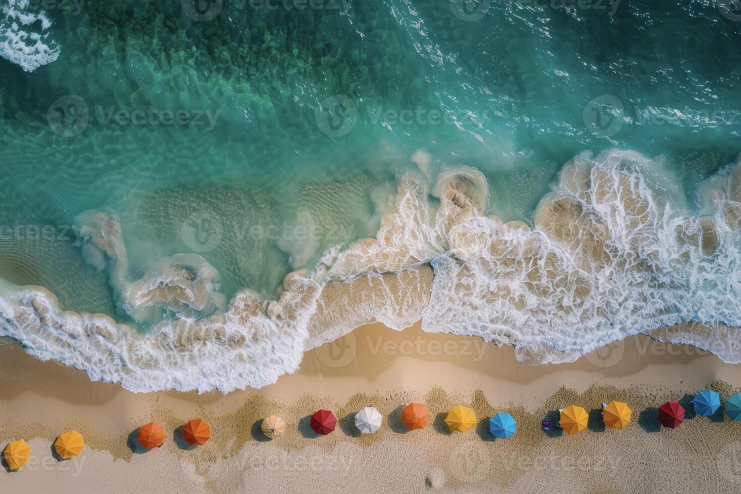 An aerial view of umbrellas on the beach photo