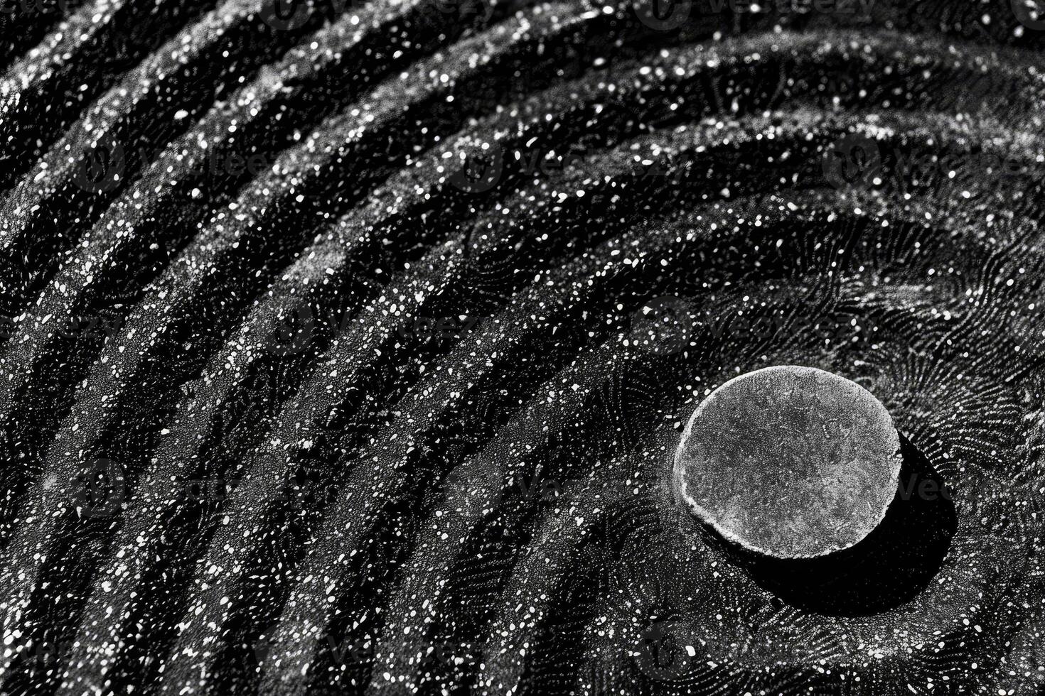 A black and white photo of a circle with a circle in the middle