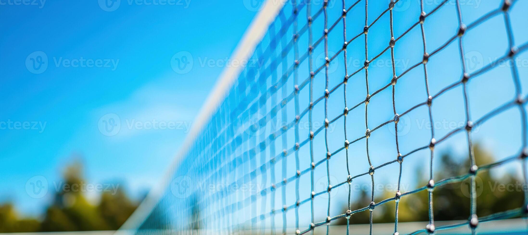 Anticipation on the Court. Badminton Net Setup Against a Clear Blue Sky photo