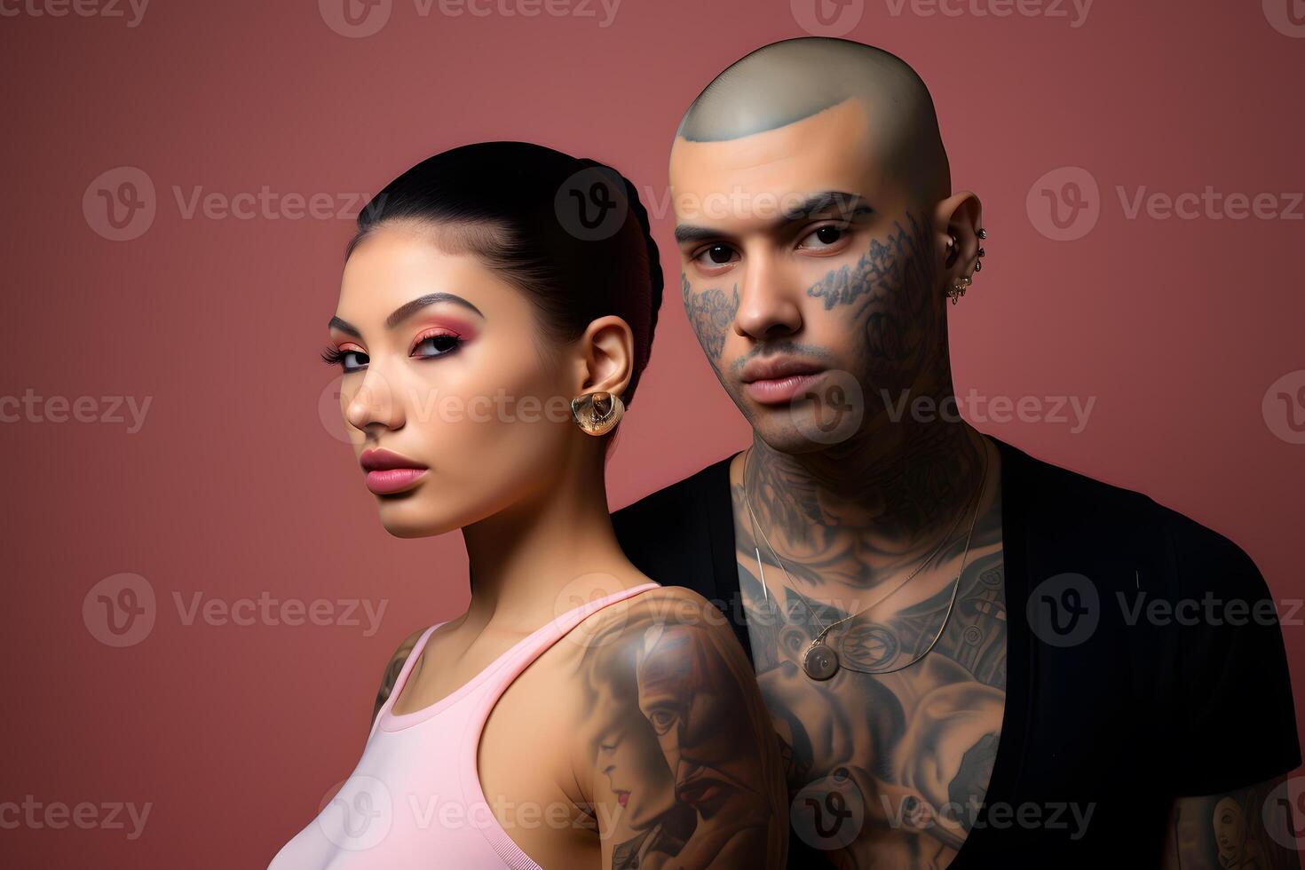 Colorful studio portrait of a group of a mixed races couple with tattoos. photo