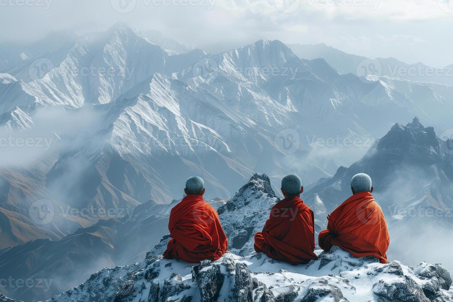 Monks Meditate on a Snowy Himalayan Mountaintop in Serene Silence photo