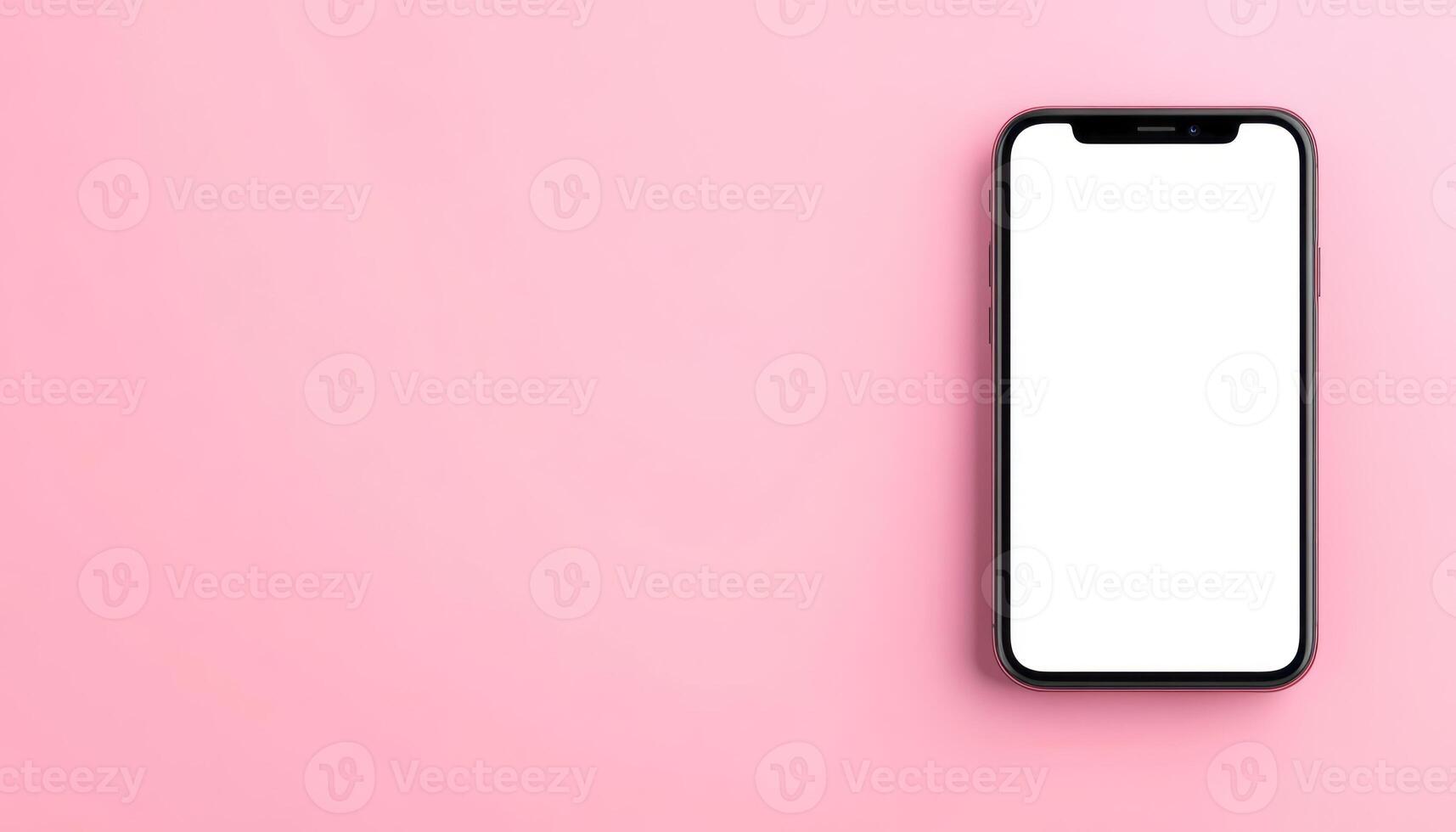 Blank smartphone screen positioned on a soft pink background ready for design mockups photo