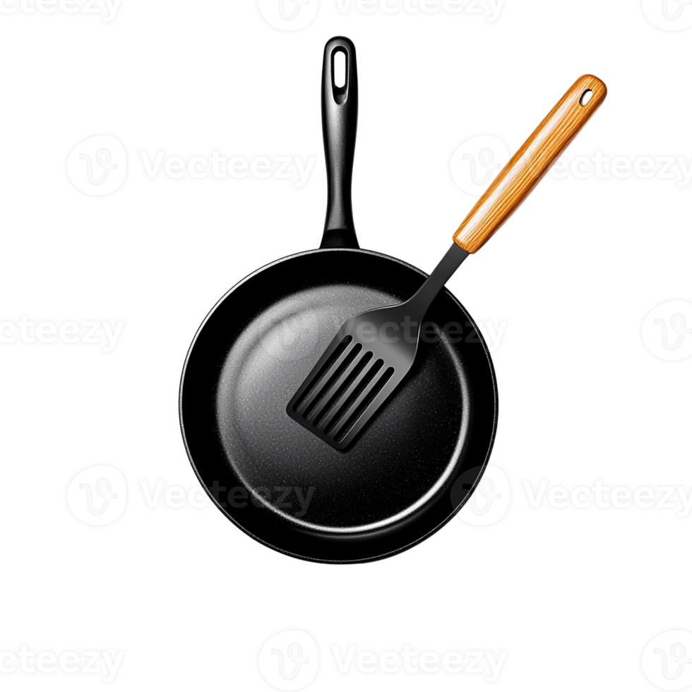 A non-stick skillet with spatula, perfect for cooking delicious meals. png