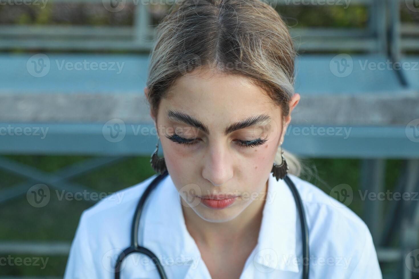 Tired Doctor Reesting For Some Minutes photo