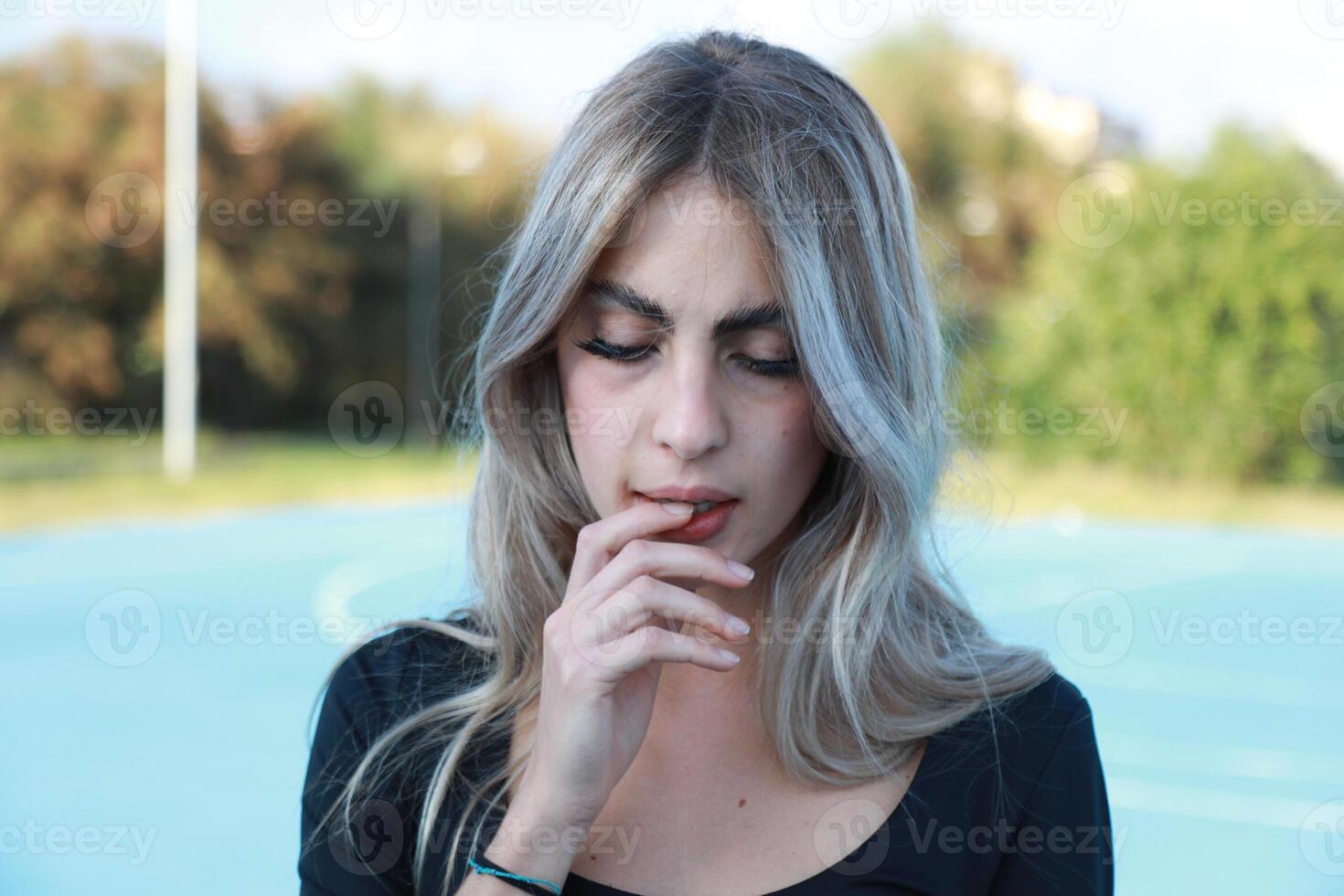 Reading A Message And Biting The Finger photo