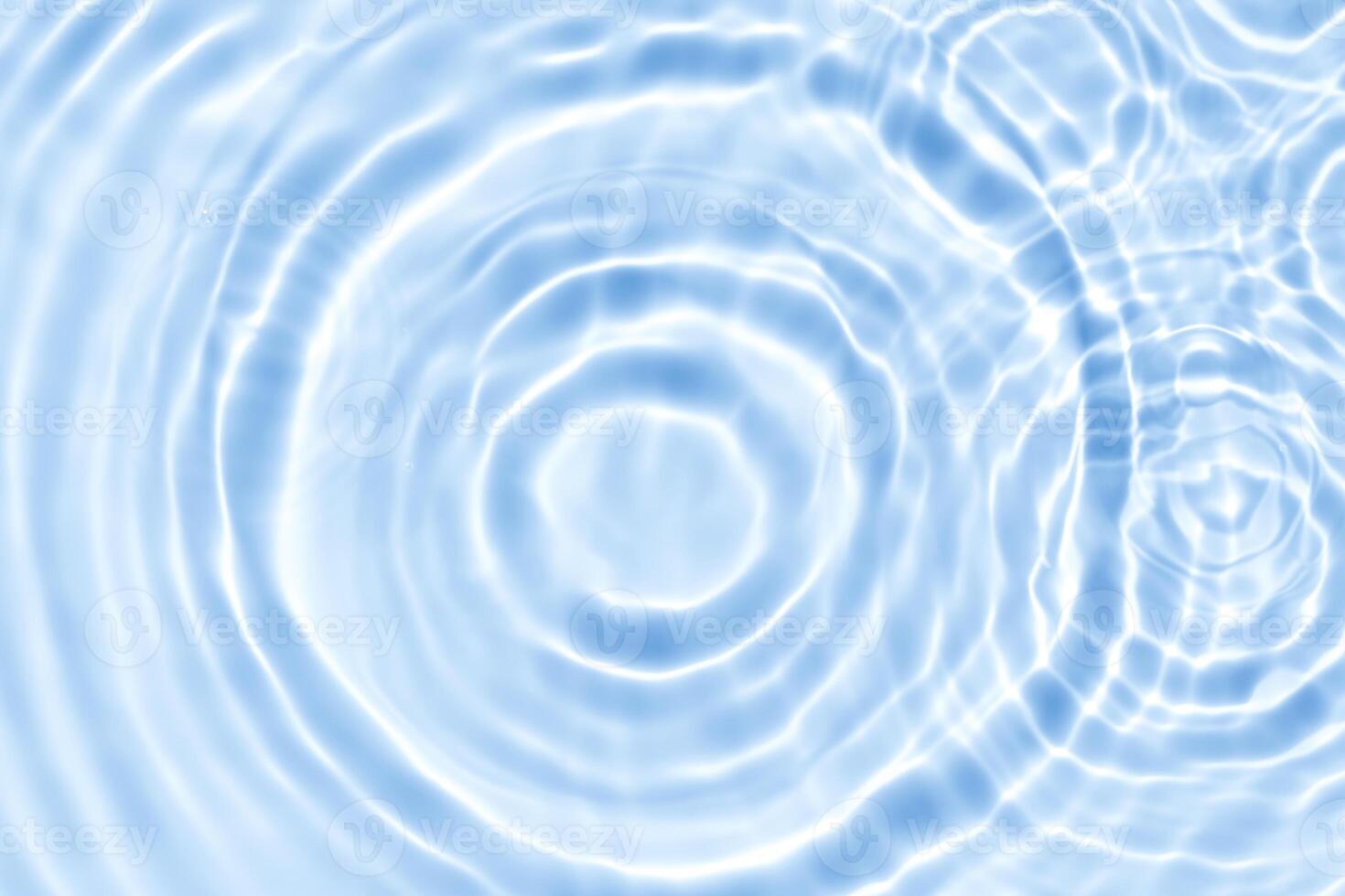 Water background,Summer blue water ripple surface texture wave in bathroom,Top view swimming pool with natural sunlight effect on abstract circle pattern for spa photo