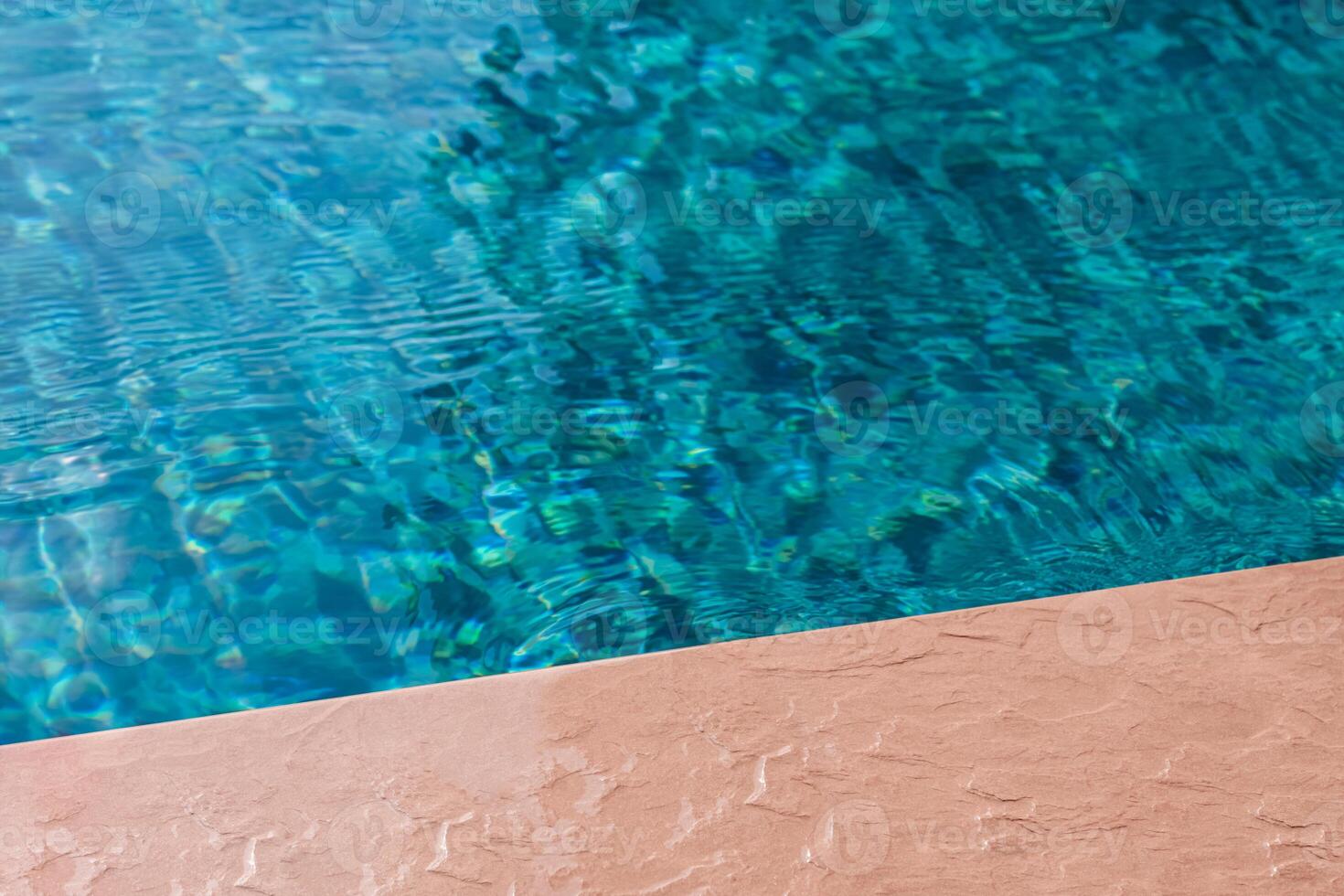 Pool edge background with water texture pattern for summer banner,Top view Swimming pool with nature light reflection on blue water wave,Backdrop mockup with copy space for spa,beauty,cosmetic product photo