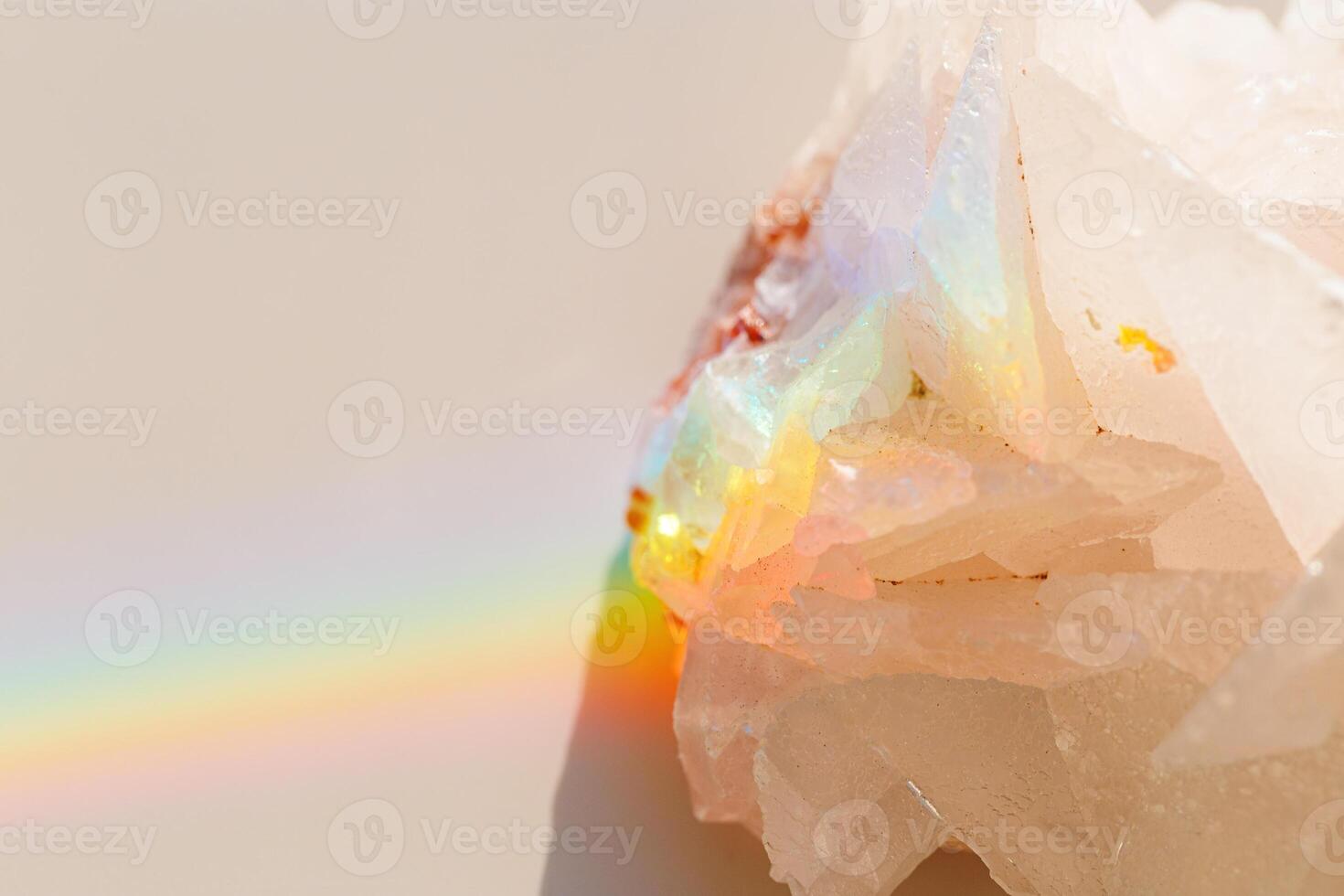 Quartz Prisms Rainbow Reflection at sunlight, close up of clear quartz crystal captures prismatic rainbow, natural facets and beauty of mineral. Minimal aesthetic nature pattern, beige pastel tone photo