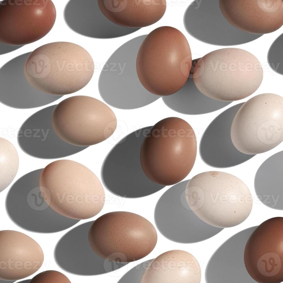 Natural eggs repeat pattern, beige brown colored Chicken egg with shadow at sunlight, mocha mousse trend color. Minimal Easter holiday concept, top view food still life photo, trend patterns photo
