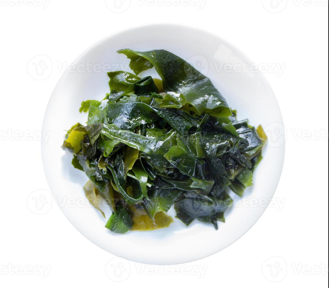 Top view of wakame konbu alga Laminaria Kelp Seaweed Isolated on White Background. photo