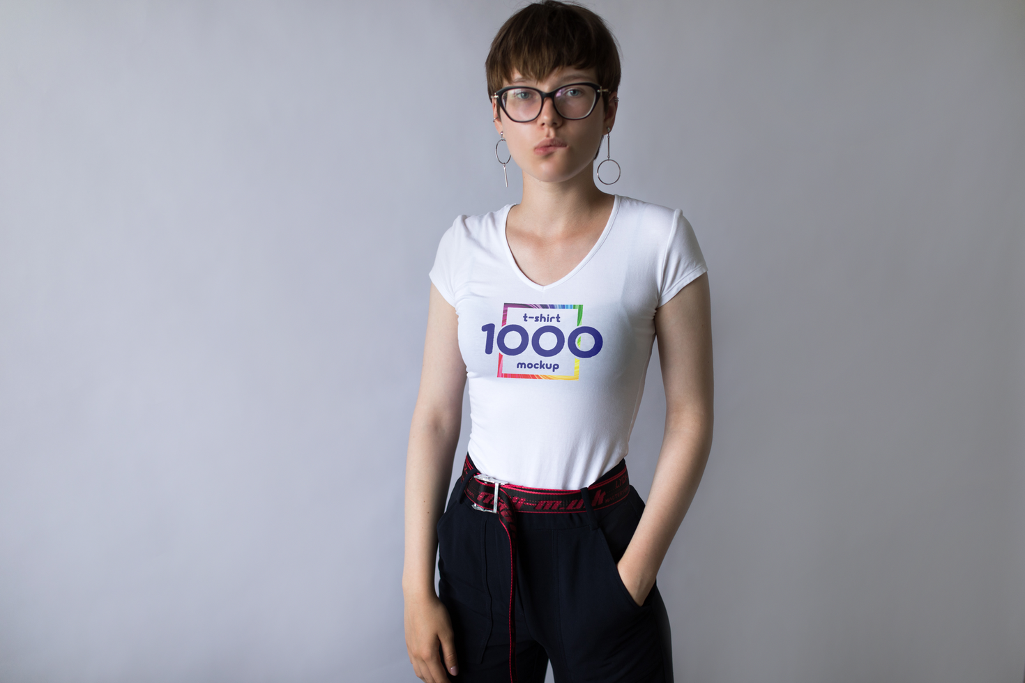 Young Woman in White T-Shirt Mockup with Graphic Design psd