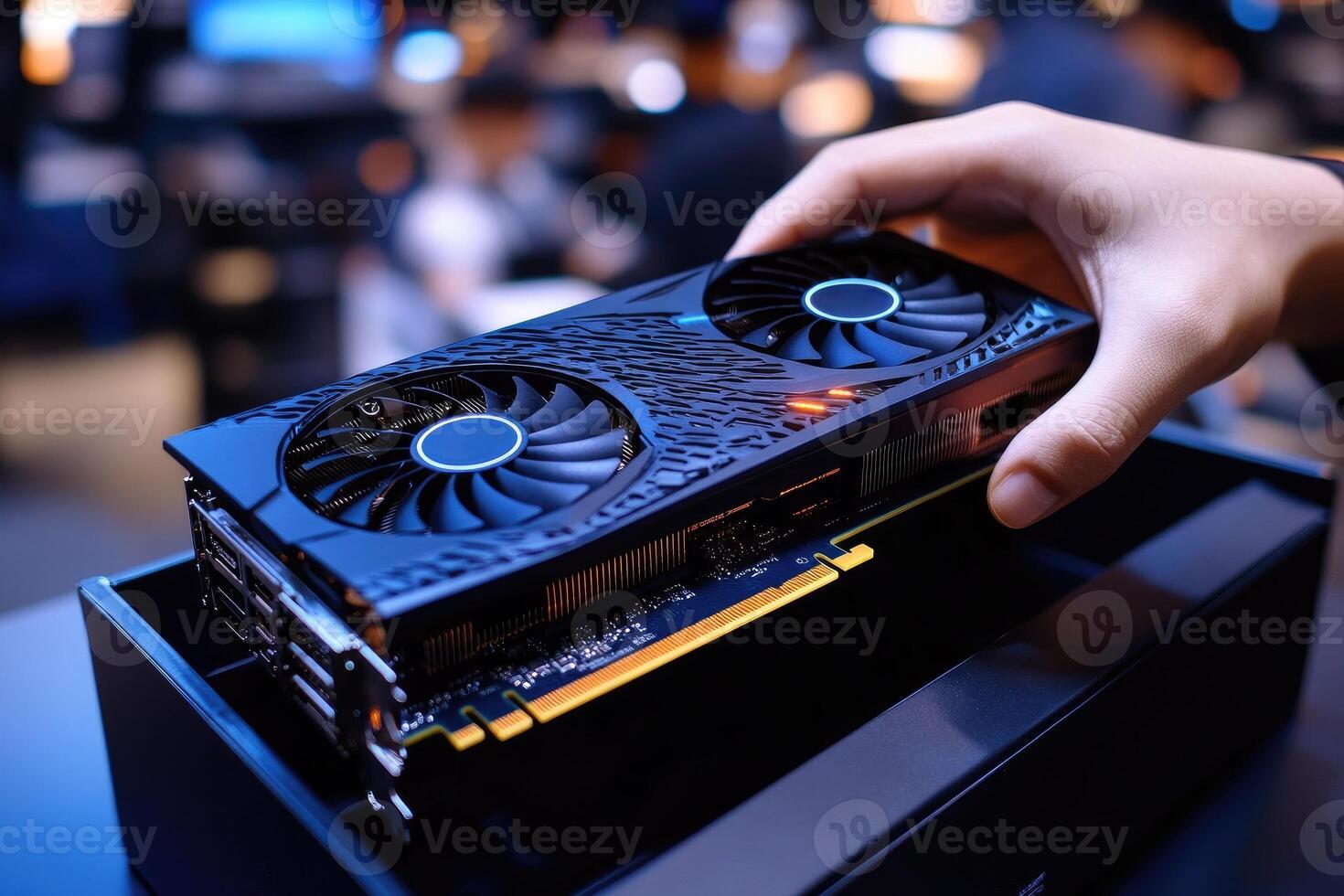 Technician installing new powerful graphics card in gaming computer photo