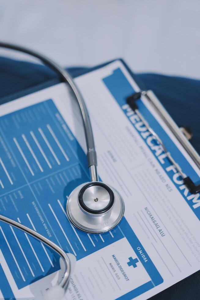Medical form on a bedside table photo