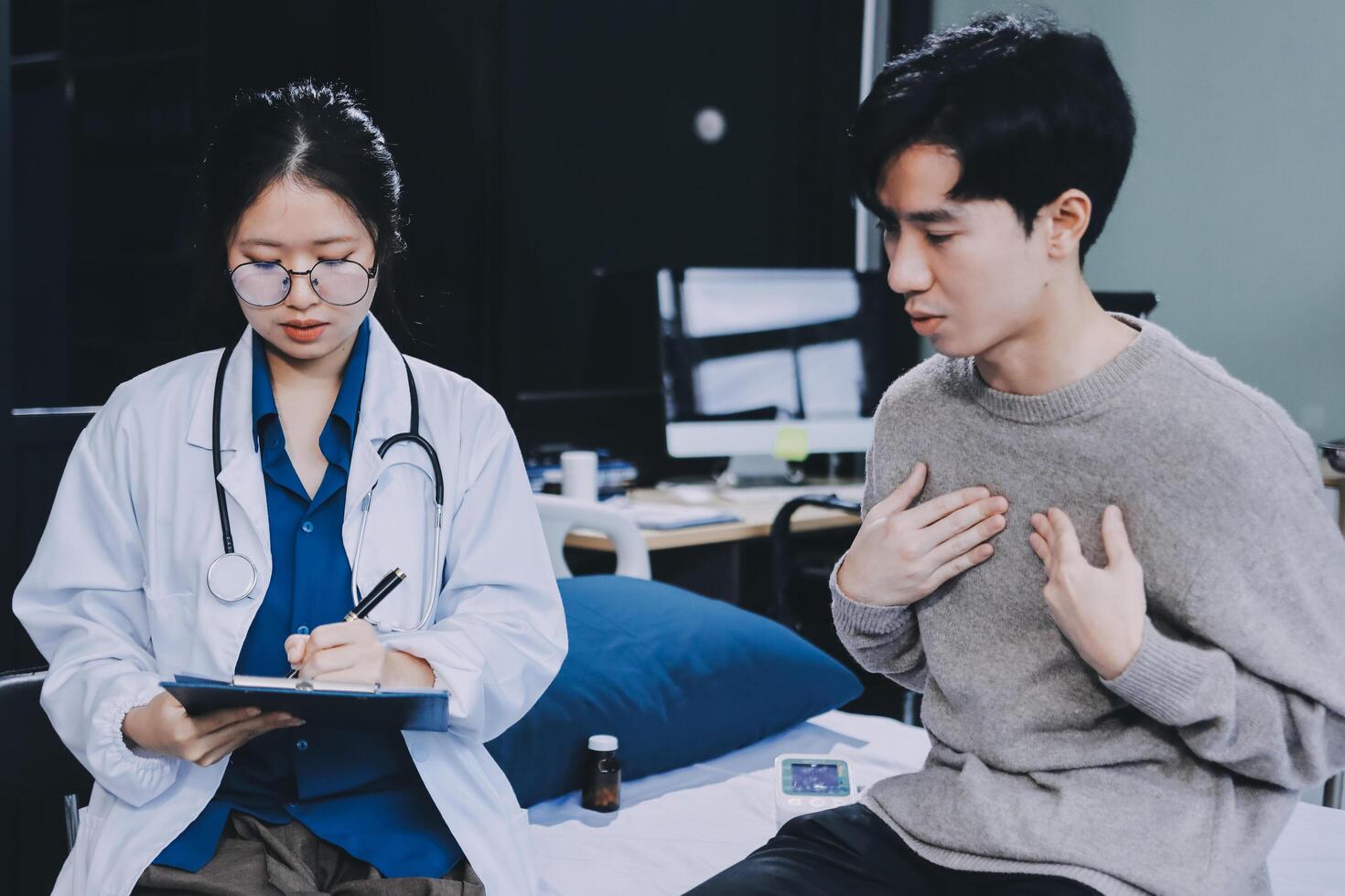A doctor is talking to a patient photo