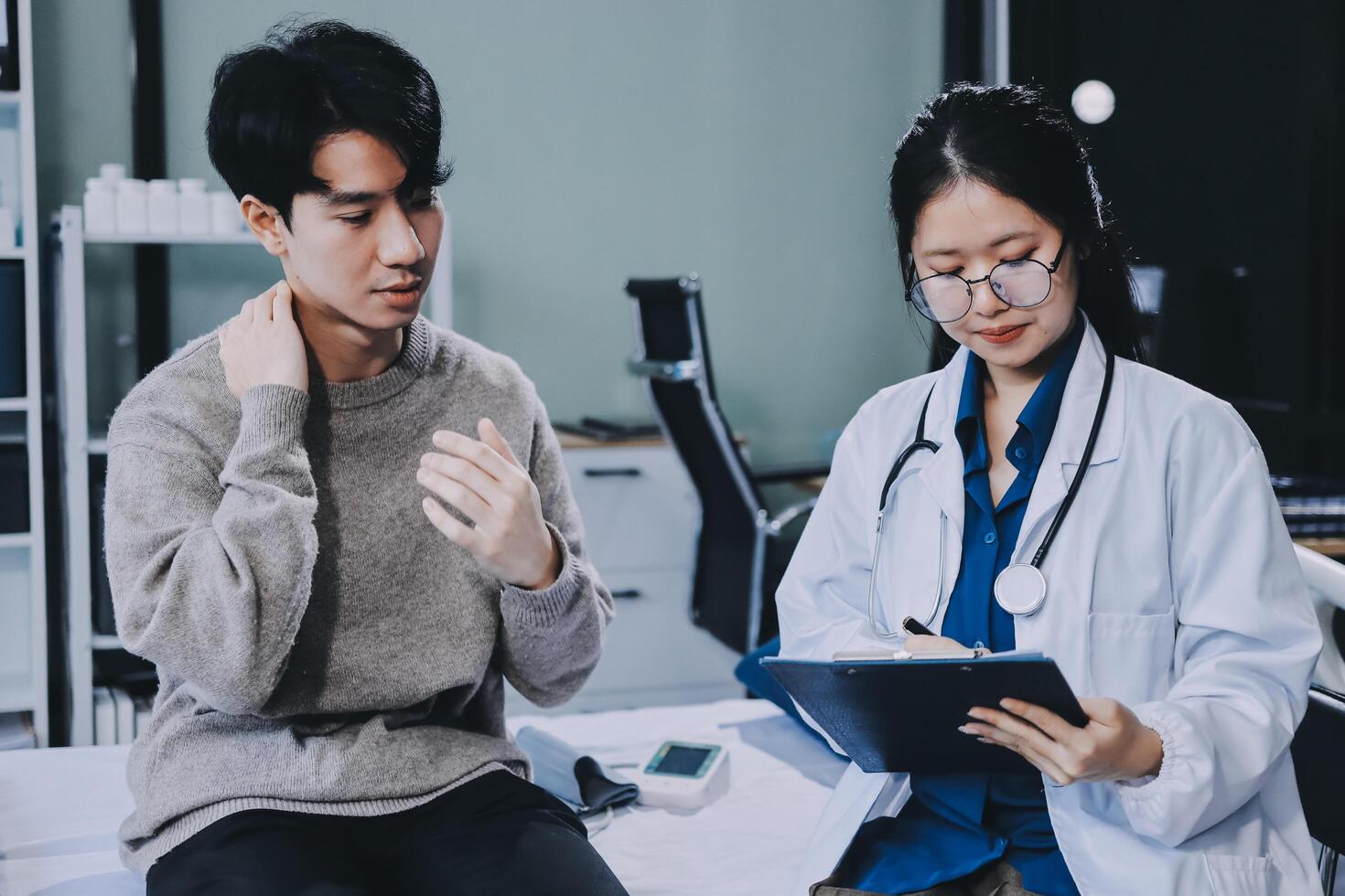 A doctor is talking to a patient photo
