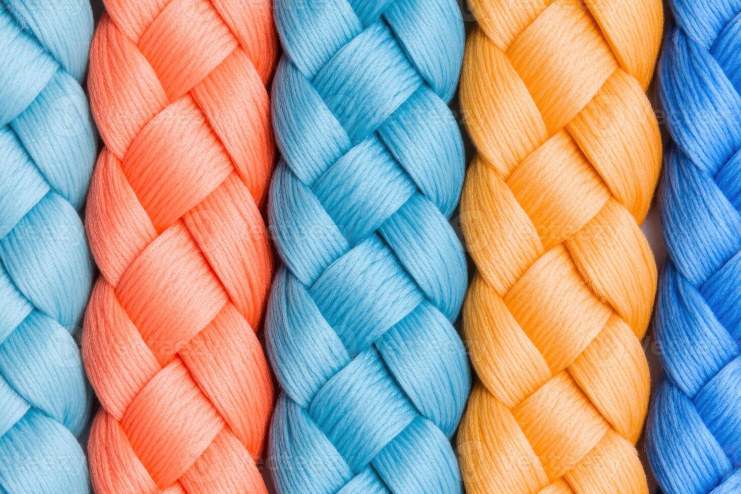 Detailed close-up of braided synthetic rope showcasing vibrant colors and intricate weaving patterns on a neutral background photo
