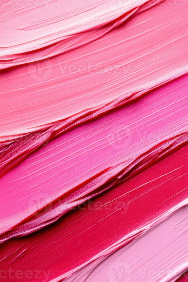 Bold lipstick texture smear showcases deep red and pink tones in artistic design suitable for beauty product branding photo