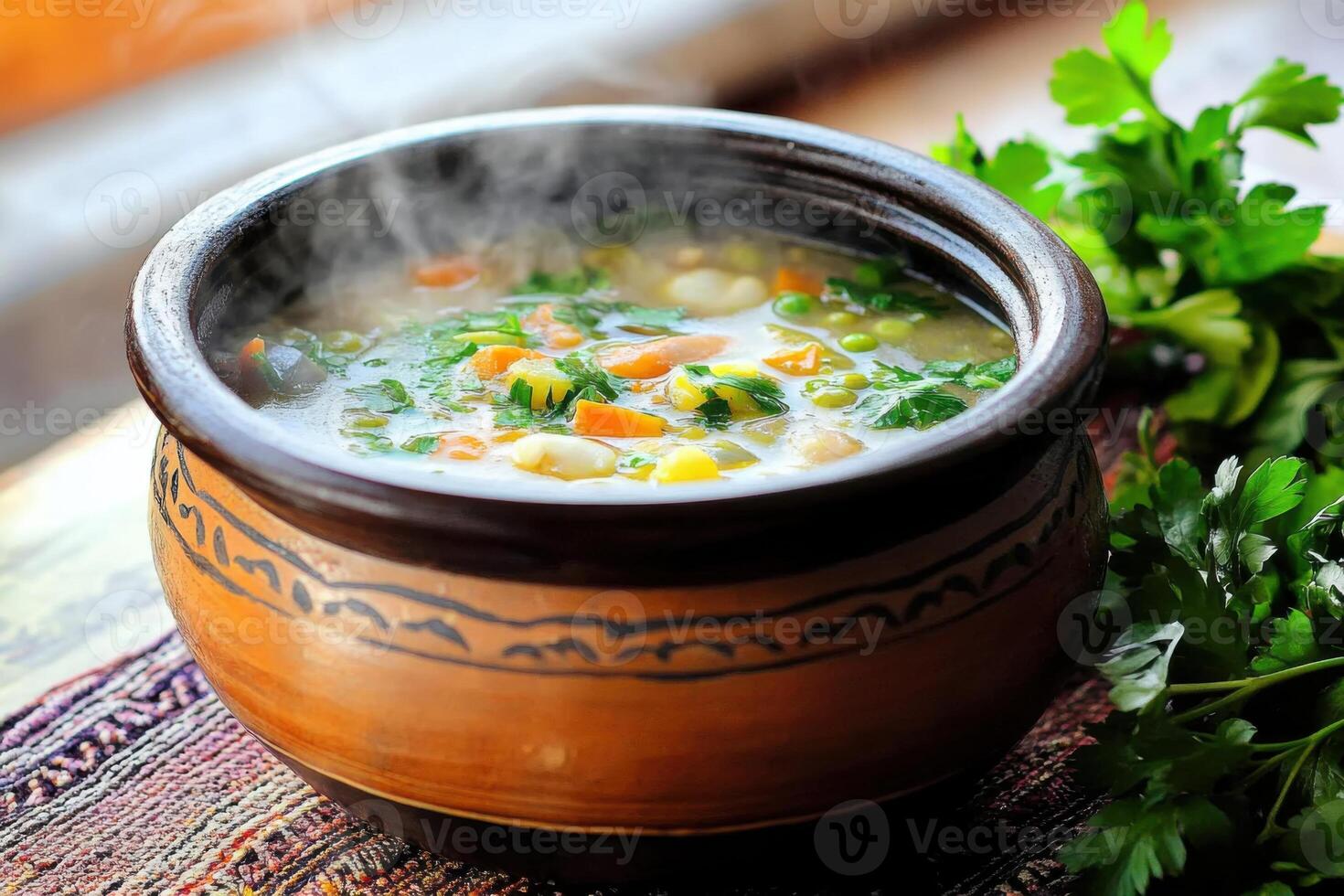 Steaming pot of seafood stew with fresh ingredients in an earthenware pot, evoking home-cooked warmth and comfort photo