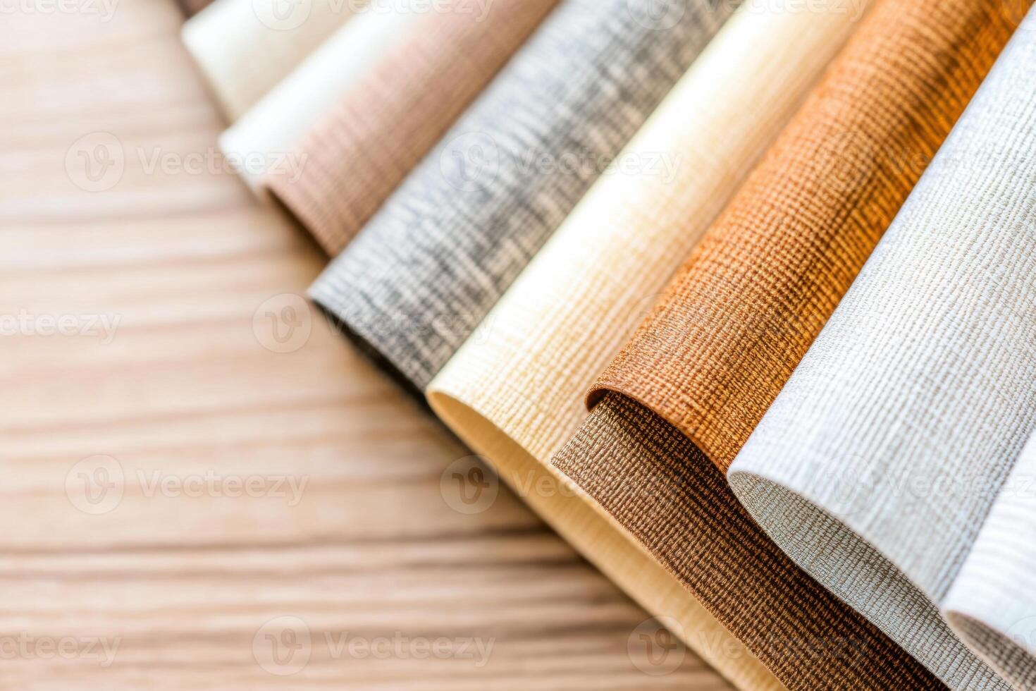 Close-up view of a sophisticated material board showcasing warm earthy tones and textures for modern interior design inspiration photo