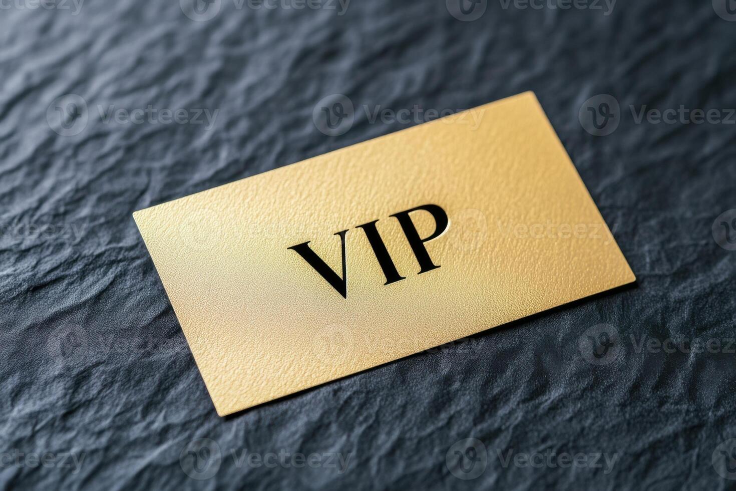 Exclusive and elegant VIP gold card glimmers on a luxurious black textured background showcasing premium design and embossed details photo