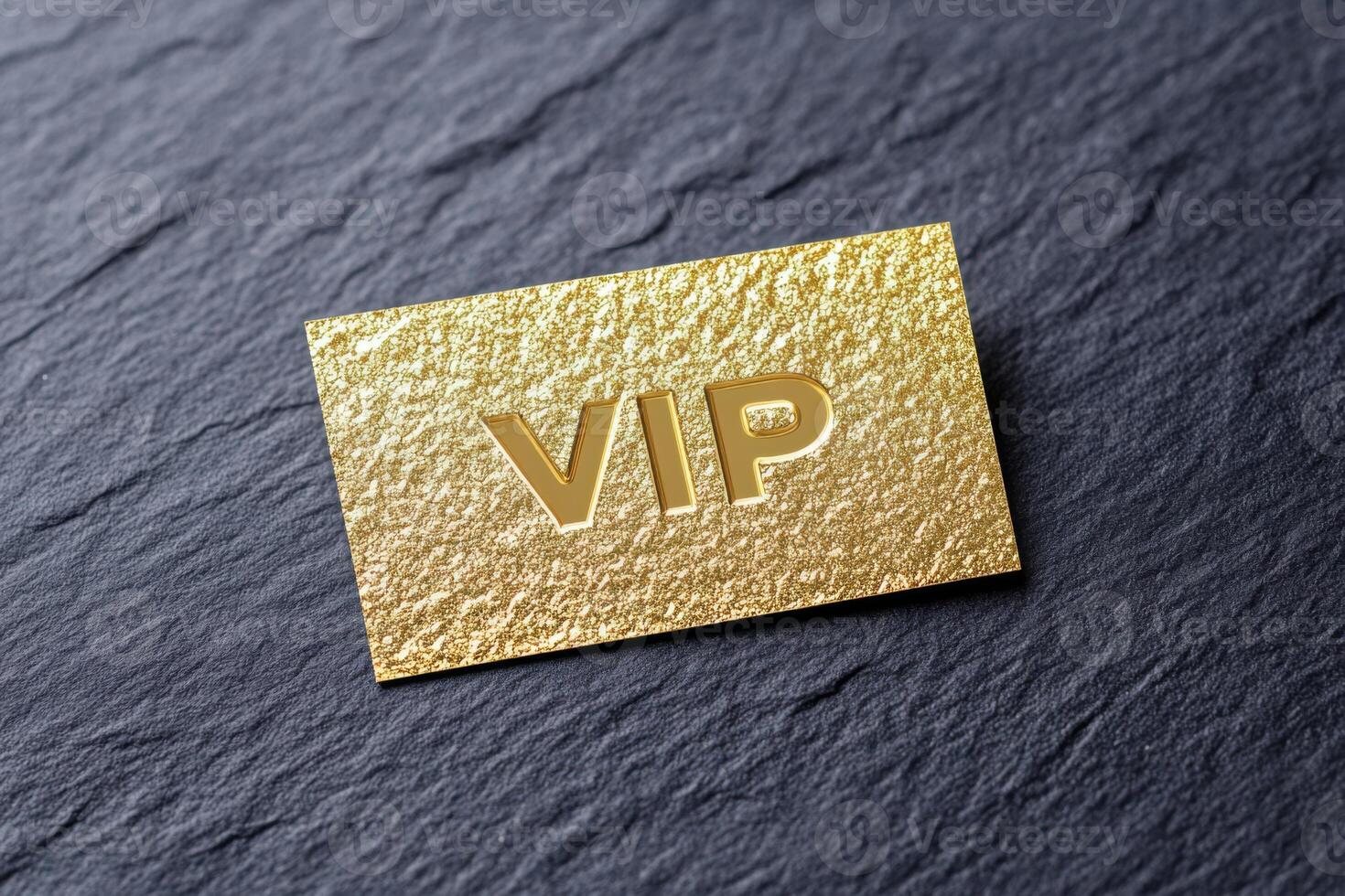 Luxurious gold VIP card with embossed details on a textured black background for premium access and exclusive services photo
