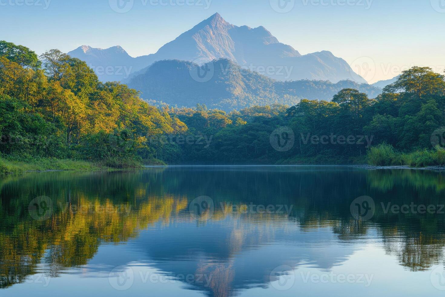 Majestic mountain reflecting in tranquil river at sunset nature photo