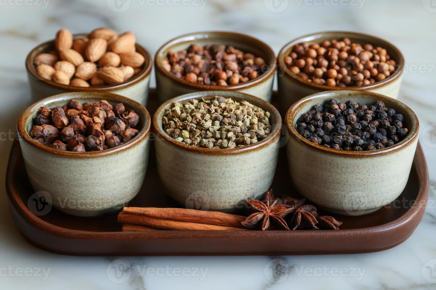 Various spices and herbs displayed on a tray, creating a vibrant culinary scene photo