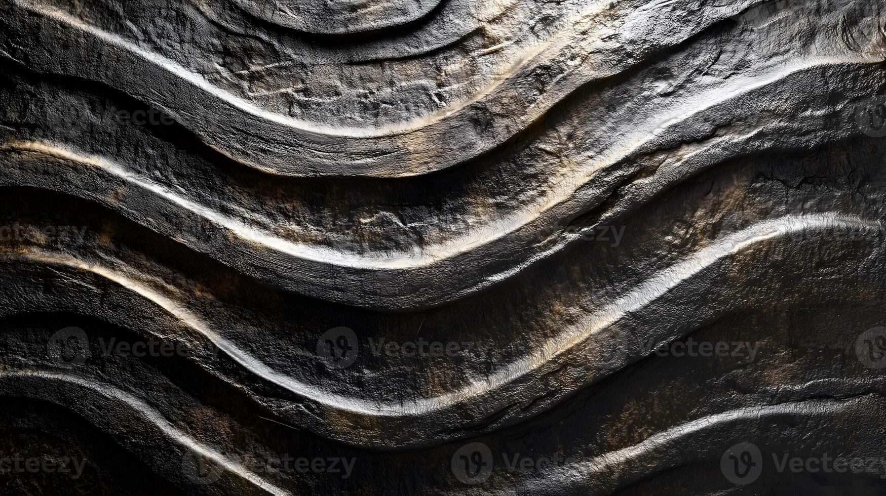 Dark Wavy Textured Surface with Metallic Highlights photo
