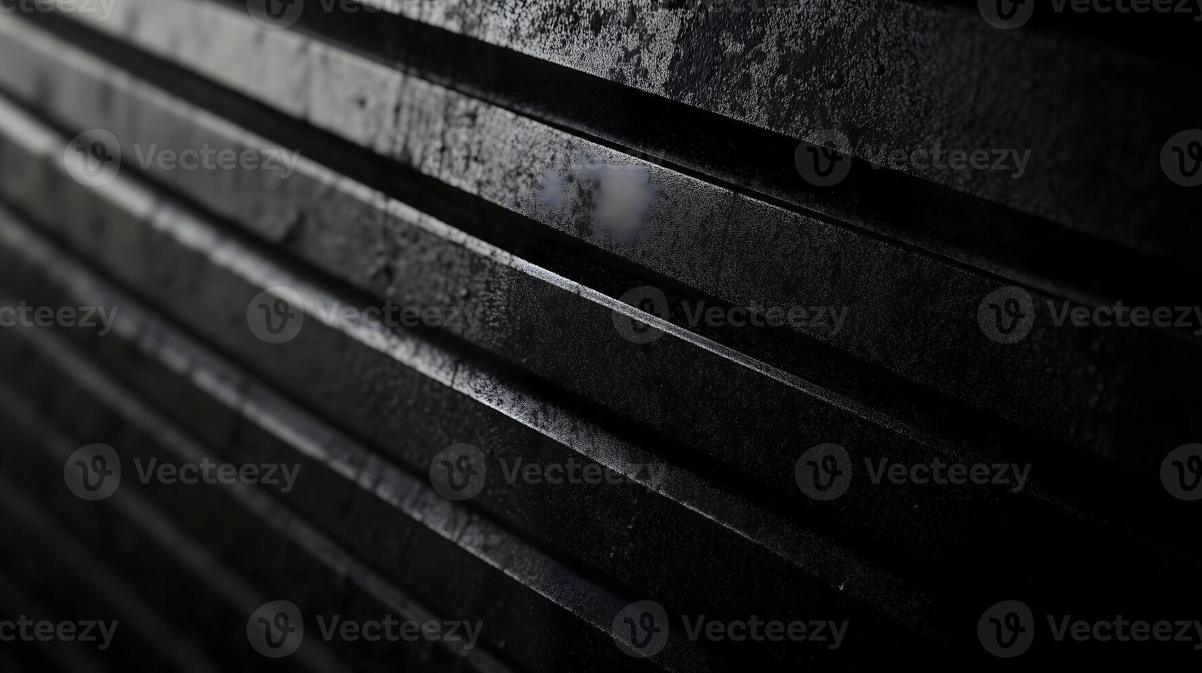 Dark Wet Textured Surface with Linear Patterns and Reflections photo
