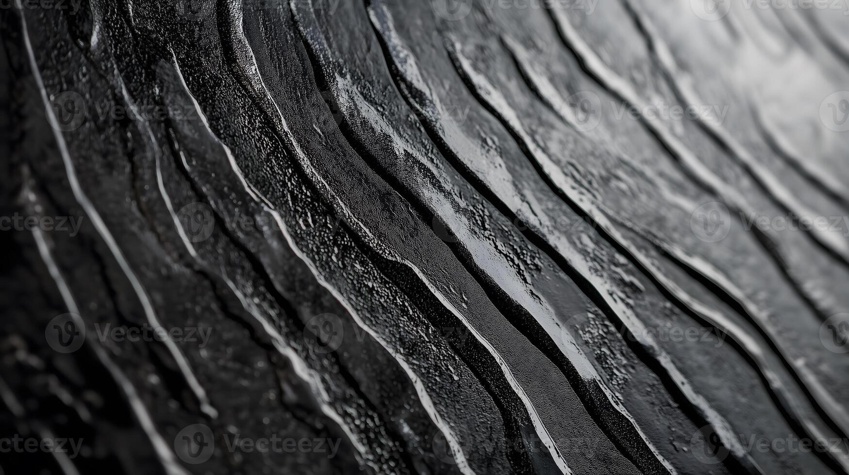 Black Wavy Textured Surface with Wet Glossy Effect photo