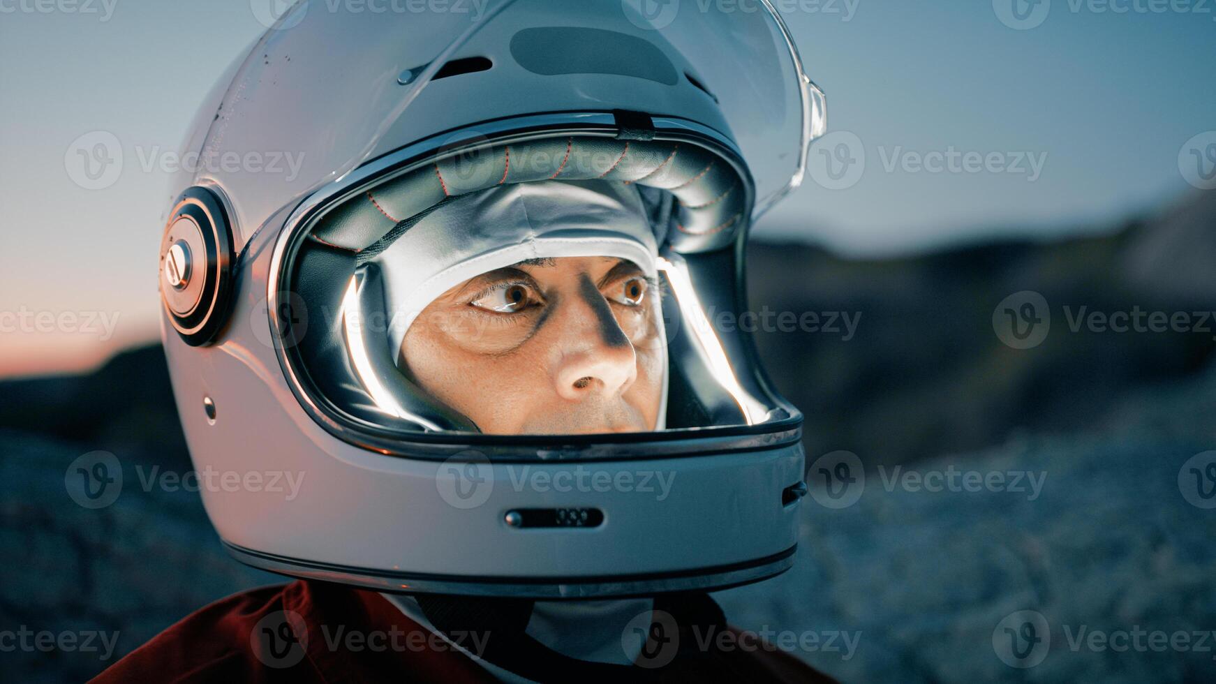 Astronaut With Helmet Prepares For Cold Night In Uninhabited Planet photo