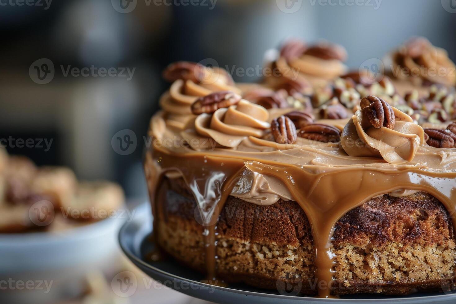 A cake with caramel and pecans on top photo