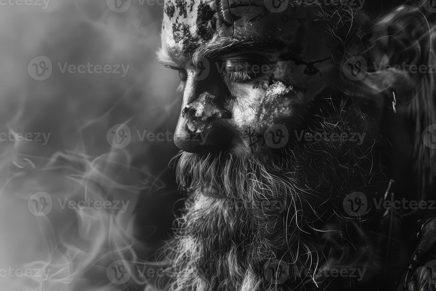 A man with a beard and smoke coming out of his mouth photo