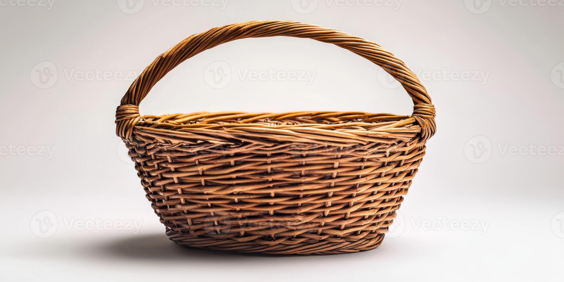 Handwoven wicker basket on a neutral background showcasing craftsmanship and natural materials, perfect for storage or decoration photo