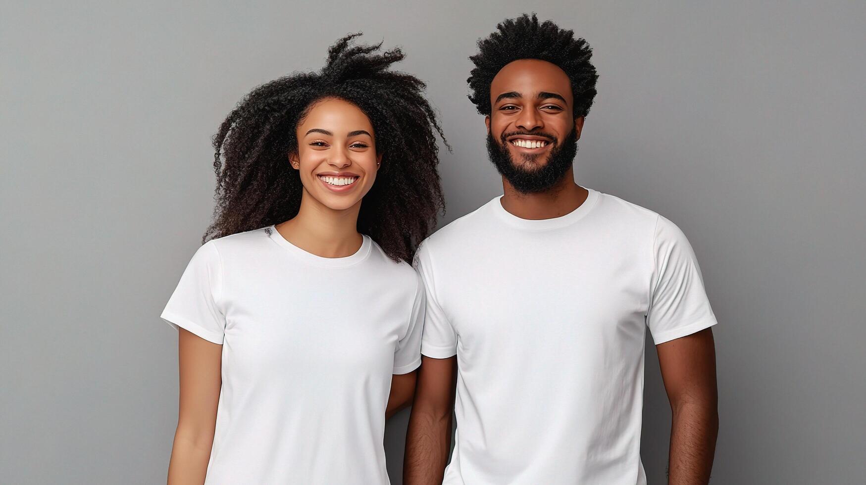 A couple in white t - shirts standing together photo