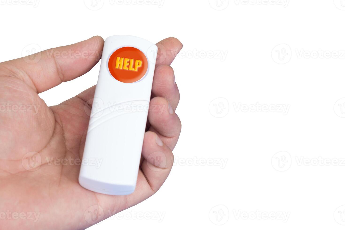 Handheld red help button designed for emergency situations held in a hand photo