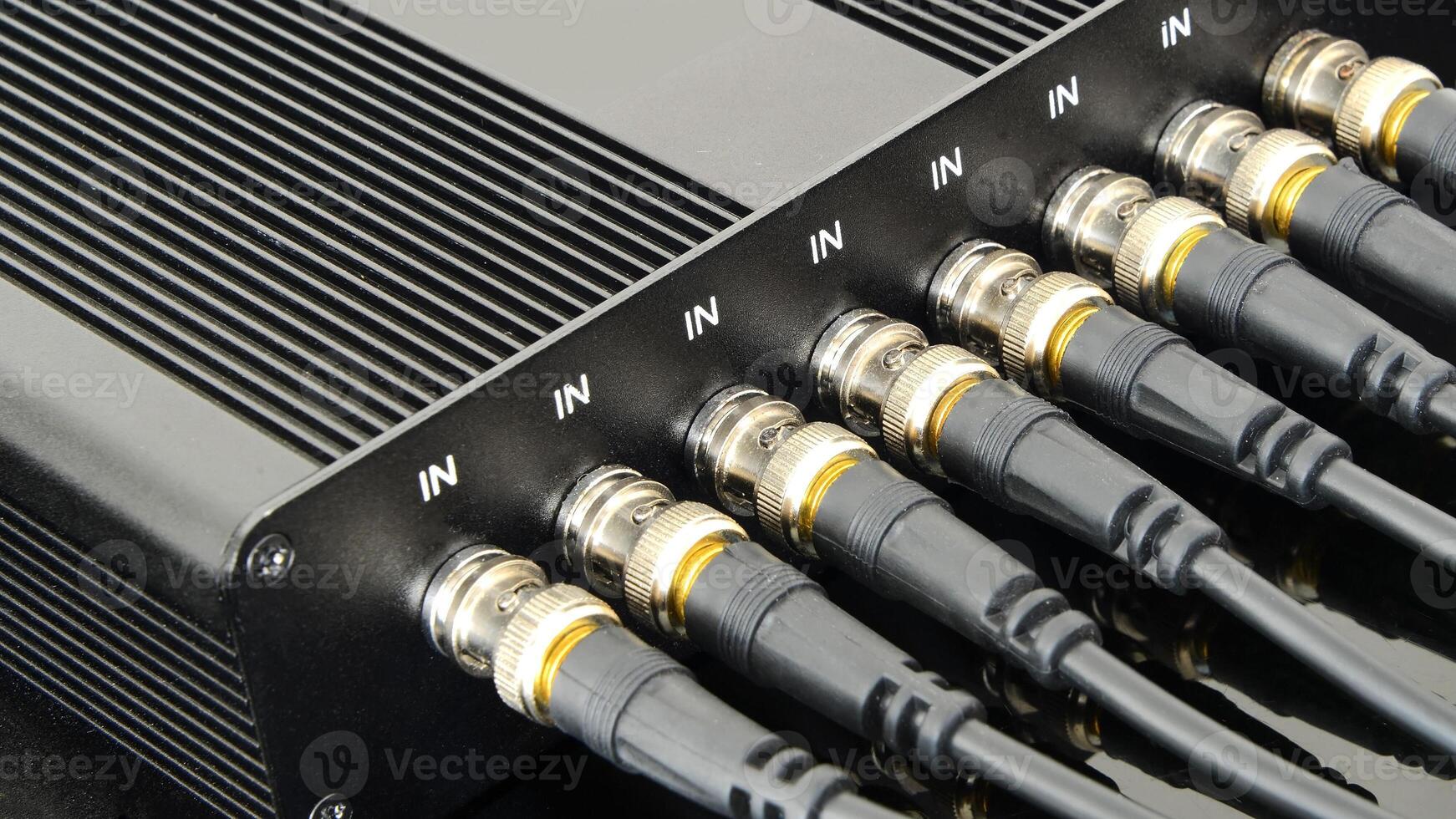 Row of BNC connectors connecting for secure signal transmission photo