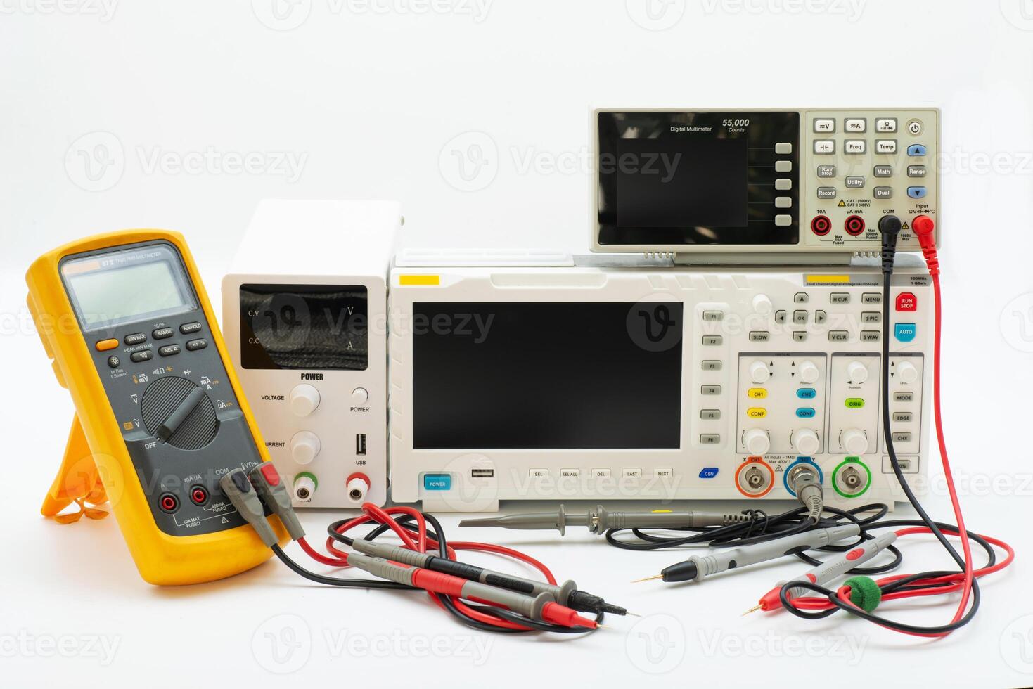 Electronics workbench showcasing multimeter, oscilloscope, and power supply for circuit testing and analysis photo