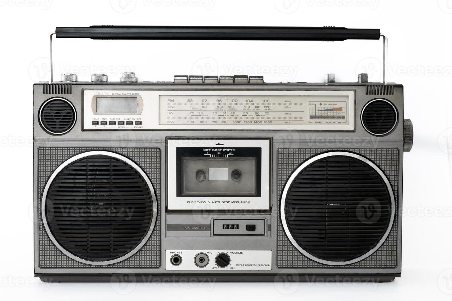 Vintage radio cassette player with dual speakers and cassette deck photo