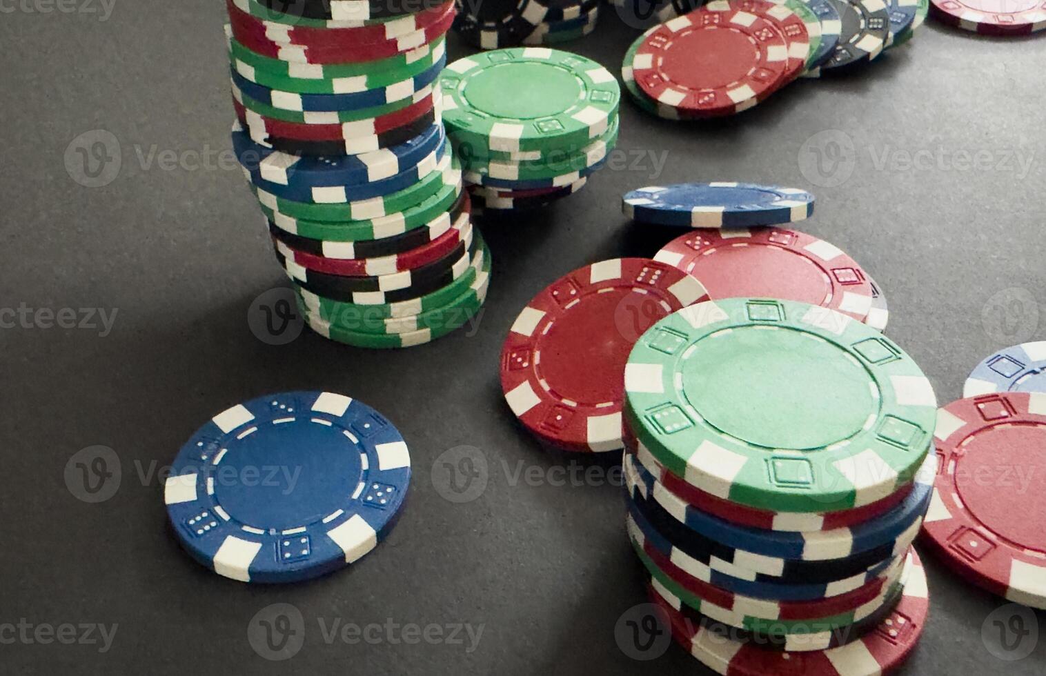 stack of chips play poker on background close up photo