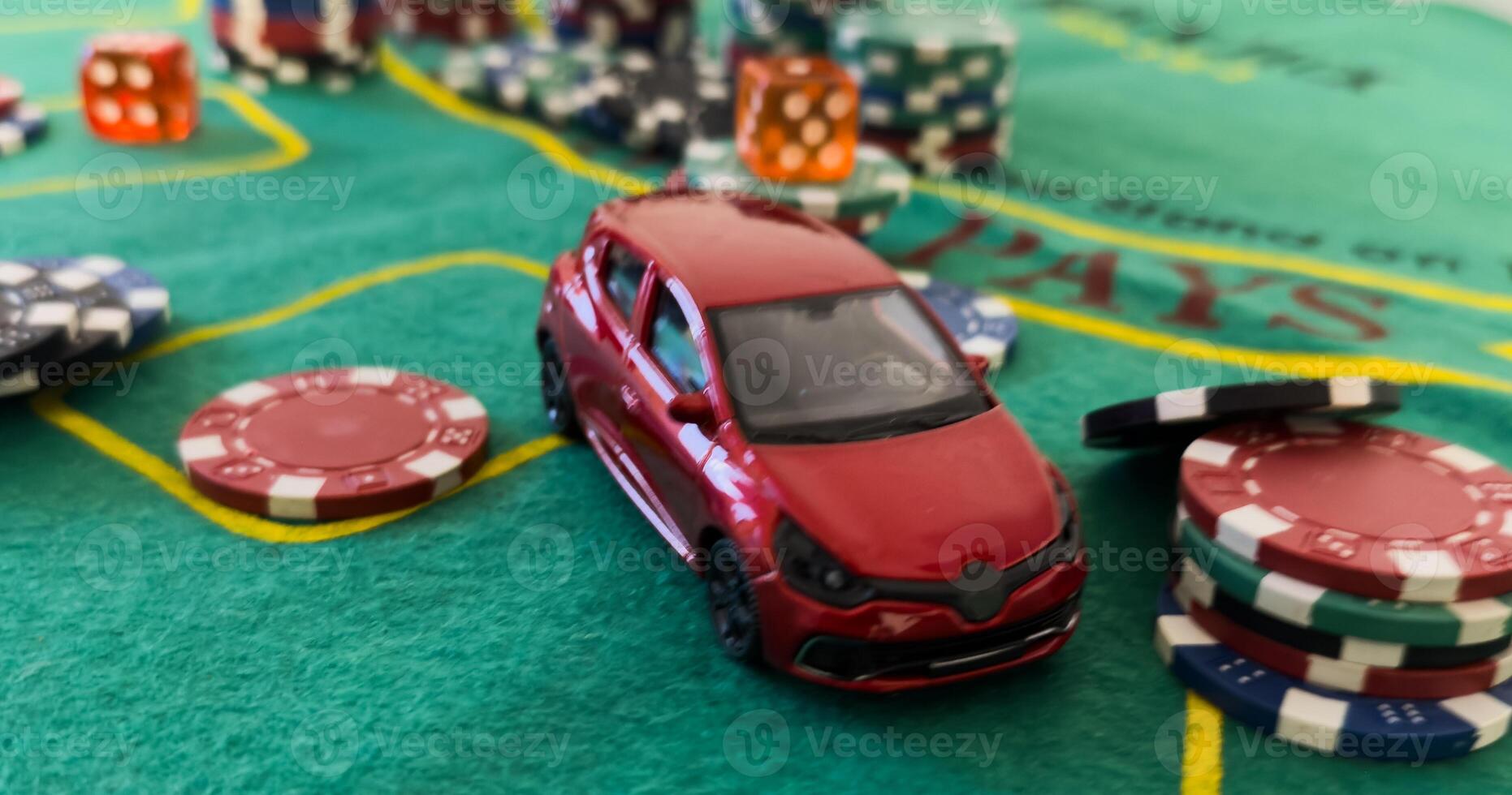 pile of casino chips and toy car photo