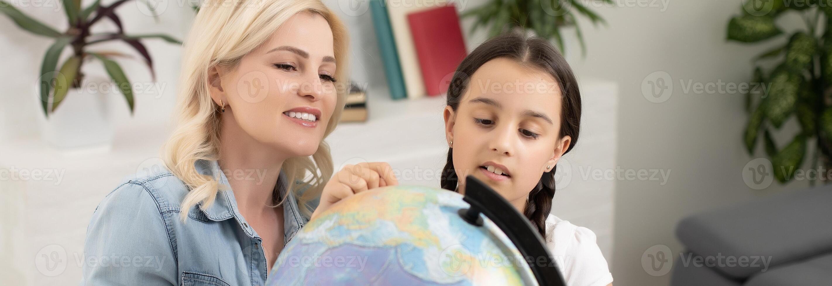 mother daughter study together at home photo