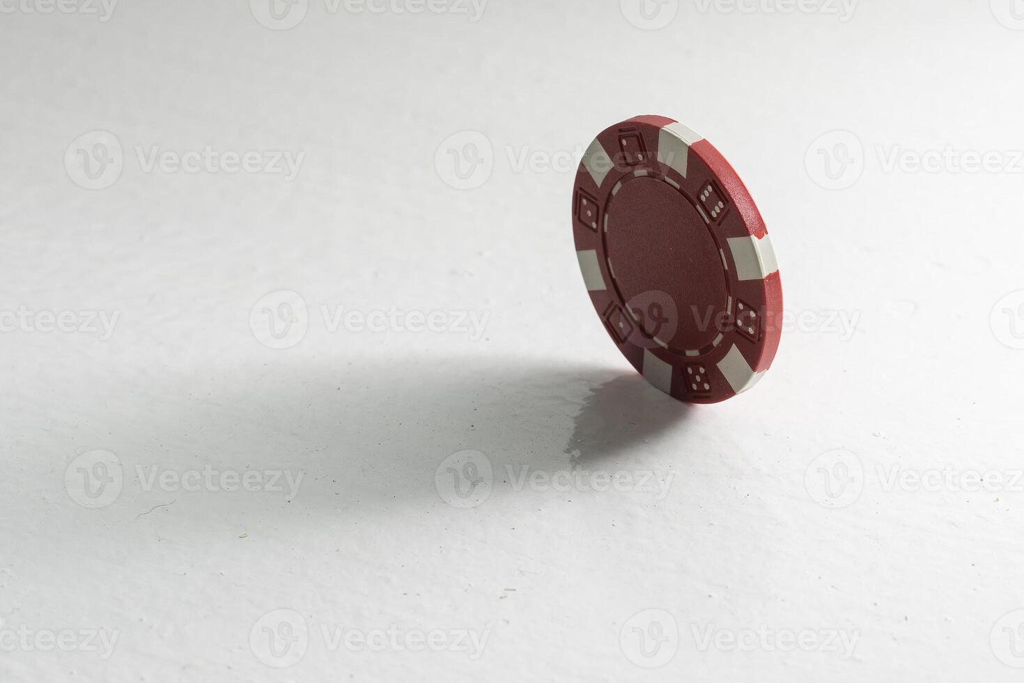 Red casino chip isolated on white. Poker game photo