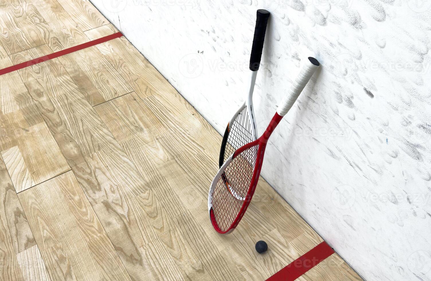 Squash Racket and Ball Sport Played by Two or Four Players. Court Floor and the Rockets photo