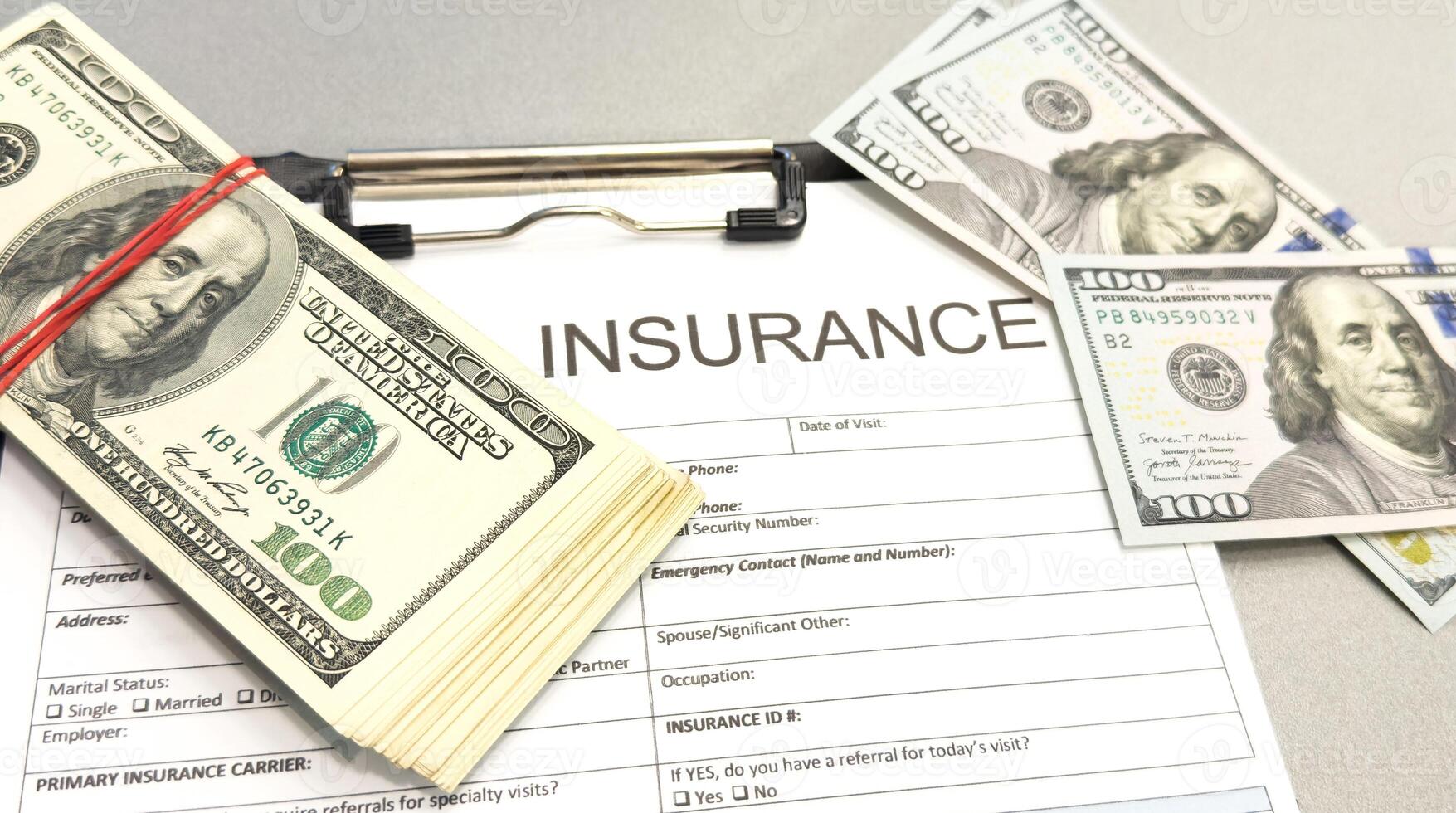 A close-up image of health insurance form on a clipboard. Medical and insurance concept. photo